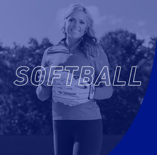 Woman wearing a glove and holding softball